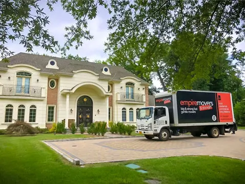 Empire mover truck in front of the house